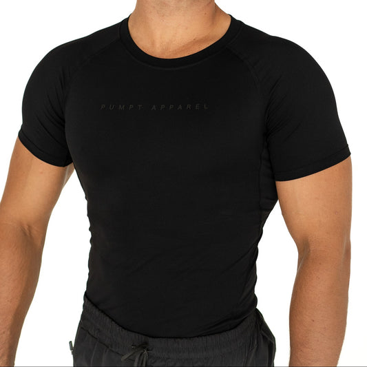 Man wearing a black t-shirt with text on a white background