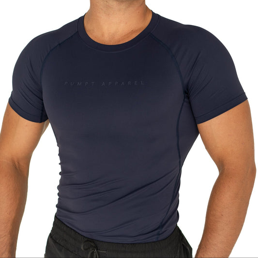 Man wearing a navy blue athletic shirt on a white background