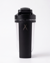 Black protein shaker bottle with Pumpt Apparel Crossed logo on a white background