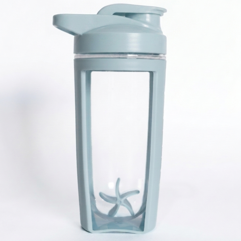 Light blue protein shaker on a white background
