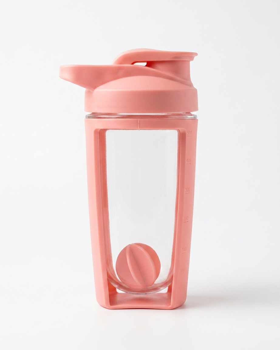 Pink shaker bottle with a clear compartment on a white background