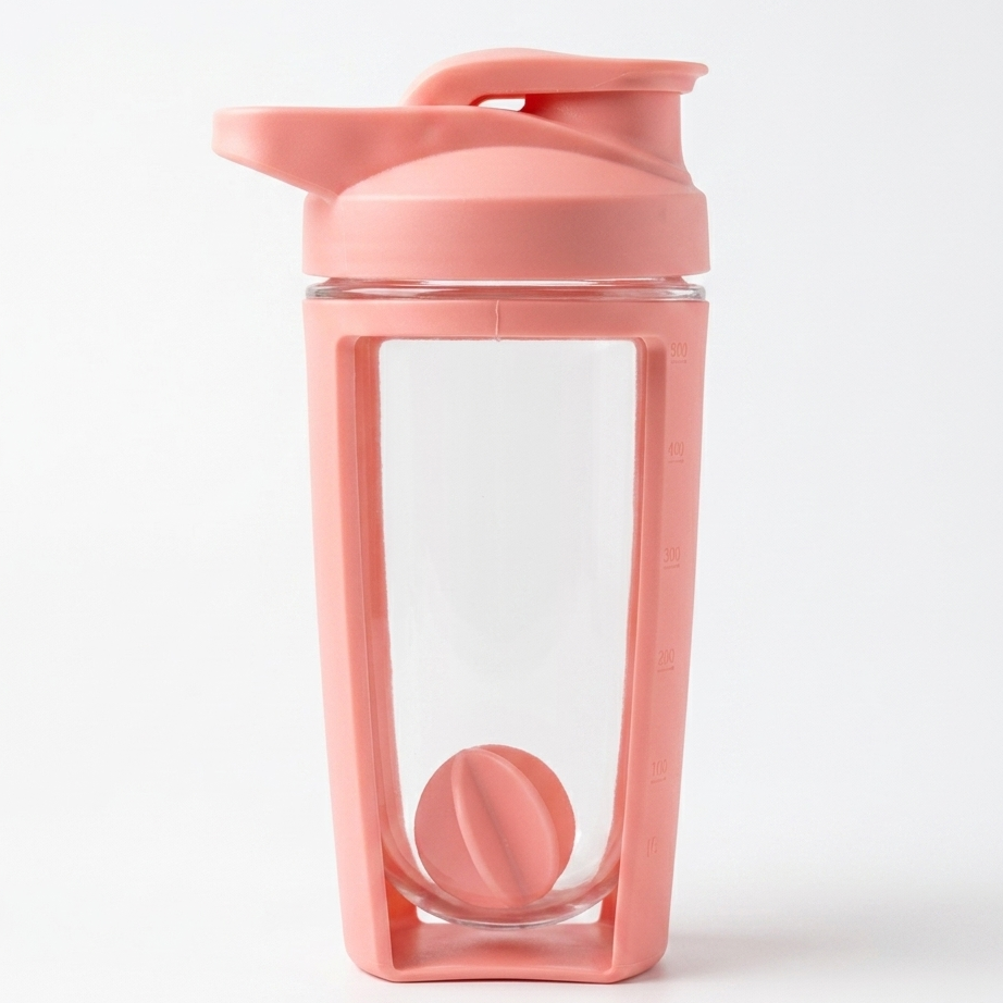 Pink shaker bottle with a clear compartment on a white background