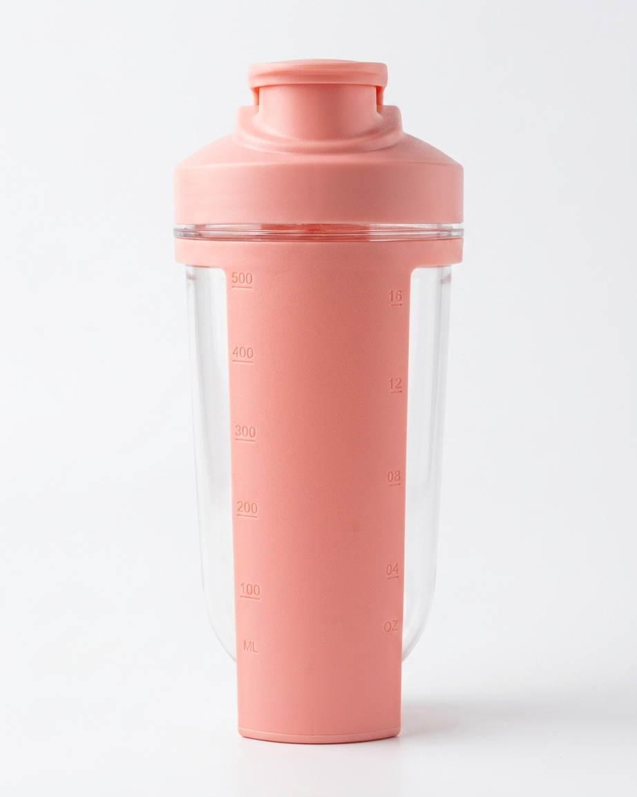 Pink shaker bottle with clear compartment on a white background