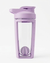 Purple shaker with a clear section and plastic whisk ball inside on a white background